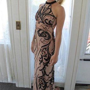 Backless, nude, embellished prom gown